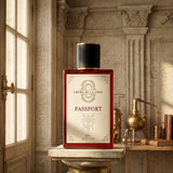 PASSPORT 100ml beside a copper still
